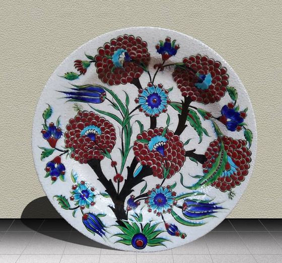 Hand-painted ceramic plate with red flowers