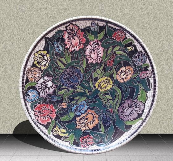 Hand-painted ceramic plate with flowers