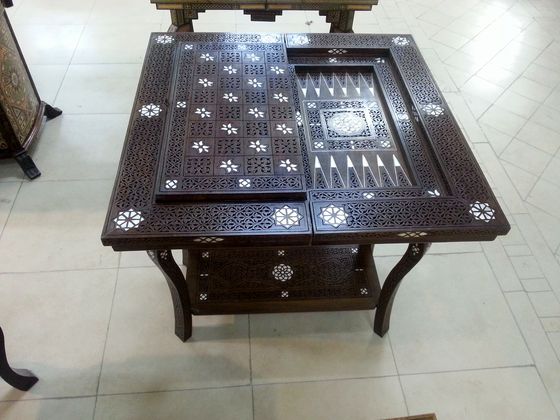Dark wood games table with mother of pearl inlay