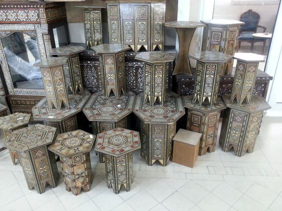 Stacked inlaid side tables in the gallery