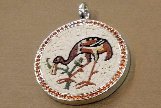 Mosaic pendant with an ostrich, framed with orange stones