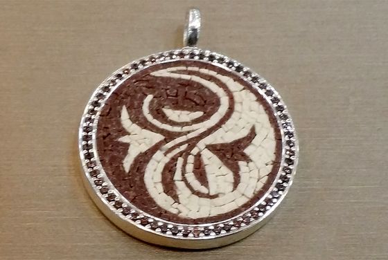 Mosaic pendant with a scroll design