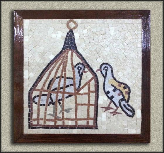 Framed mosaic of a bird and a cage